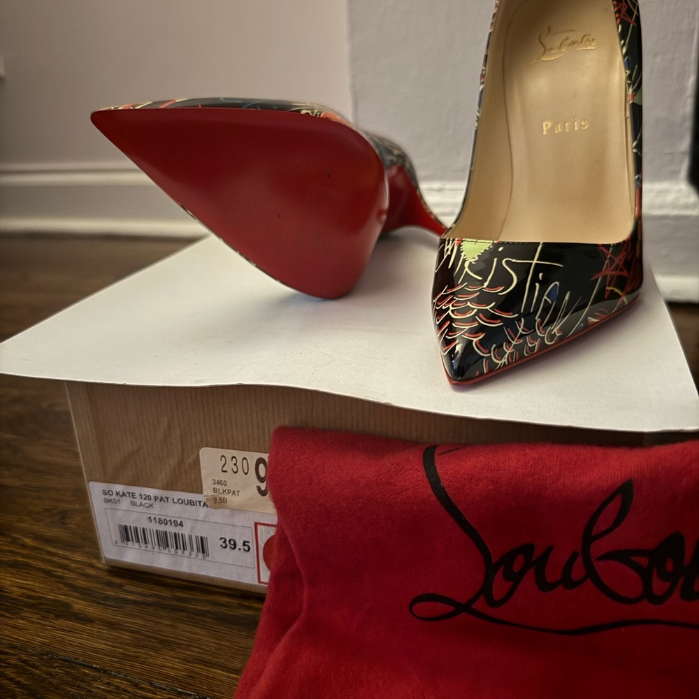 Christian Louboutin Black Heels with Red Soles